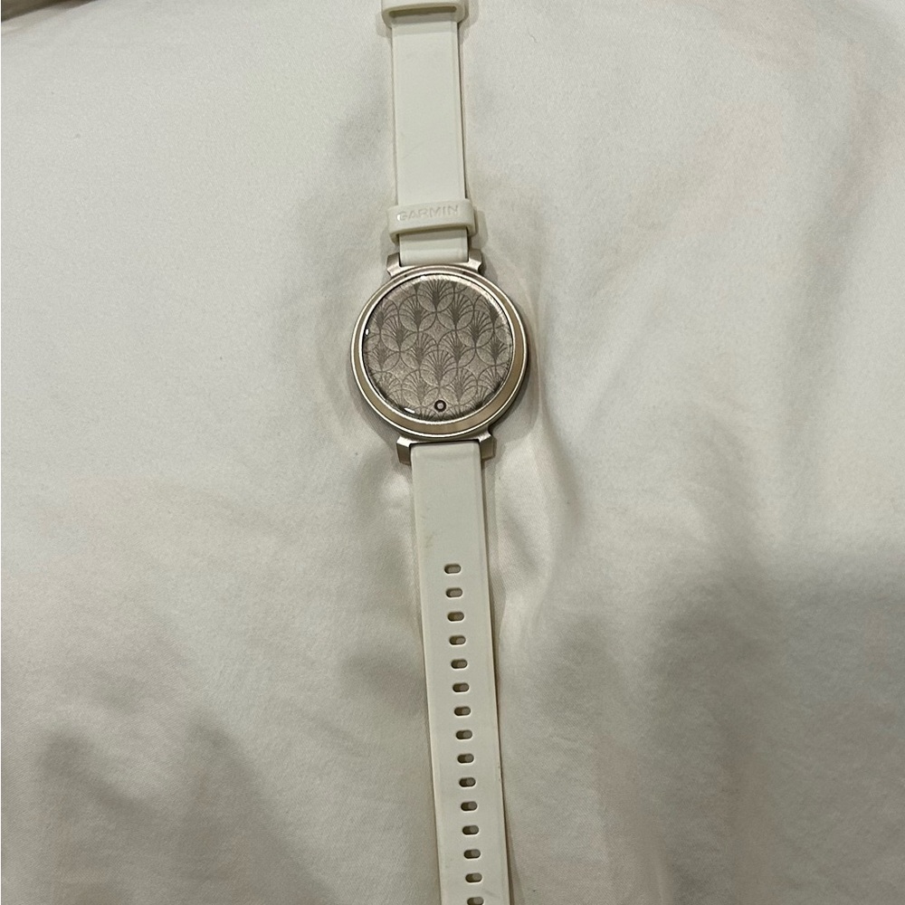 Garmin Lily Watch with cream silicone strap and brown strap